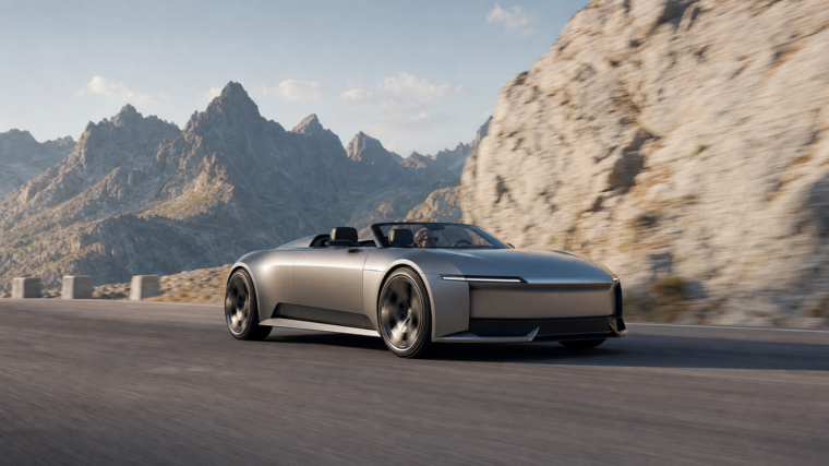 Roadster électrique argenté inspiré de l’Audi Concept C sur une route alpine